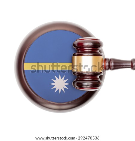 National legal system concept with flag on sound block  - Nauru