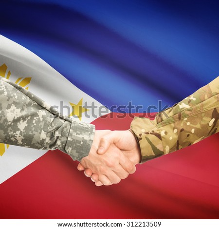 Soldiers shaking hands with flag on background - Philippines
