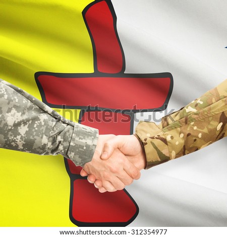 Soldiers handshake and Canadian province flag - Nunavut
