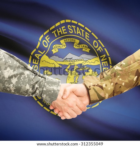 Soldiers handshake and US state flag - Nebraska