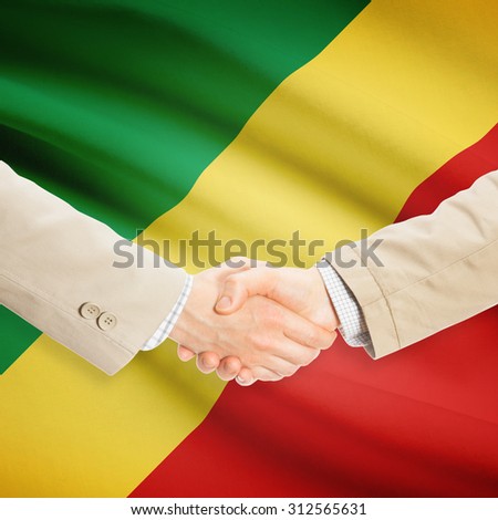 Businessmen shaking hands with flag on background - Republic of the Congo - Congo-Brazzaville