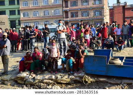 Kathmandu Nepal - May 4 2015 : People look at soldiers find body in collapsed building after earthquake disaster
