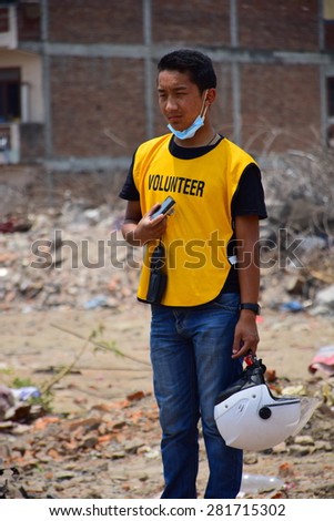 Kathmandu Nepal - May 9 2015 : Young man volunteer who help people after earthquake disaster
