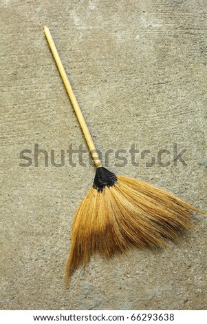 Broom on Concrete Floor