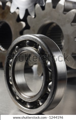 close-up of ball-bearing with three cogs