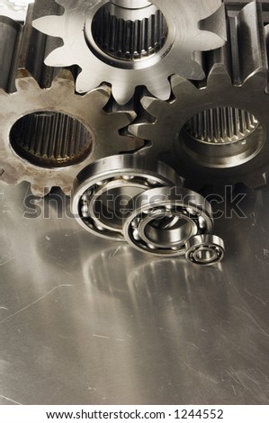 three gears and three ball-bearings