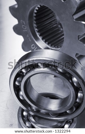 ball-bearings against cog-wheel