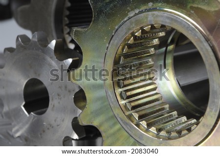 close-up of two gears connecting with each other