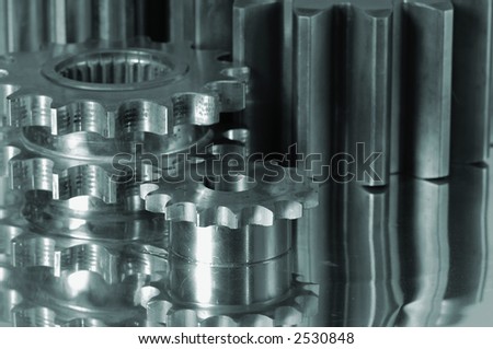 gear assembly in a metallic greenish cast