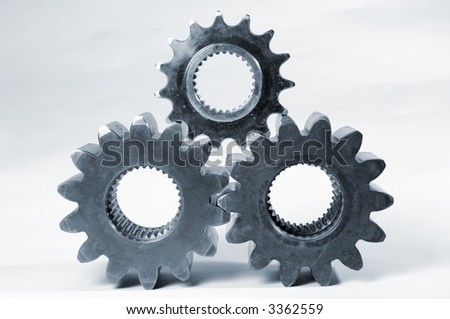 three metallic-blue gears, isolated on white, ideal for cut-outs