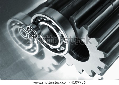 gear and bearings in a metallic duplex toning all against stainless-steel