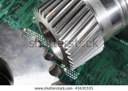industrial gear parts and cvomputers circuitboard, technological concept