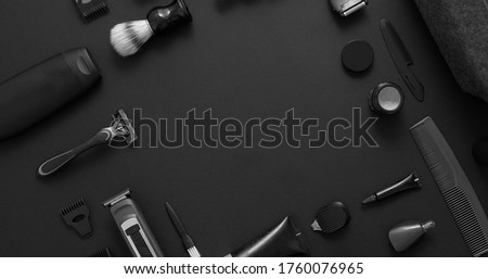 Image, Stock Photo View of a barber shop from outside the enclosure with a barber inside cutting a client’s hair