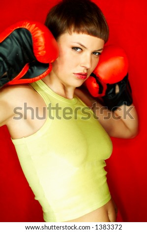Sexy female boxer with red gloves