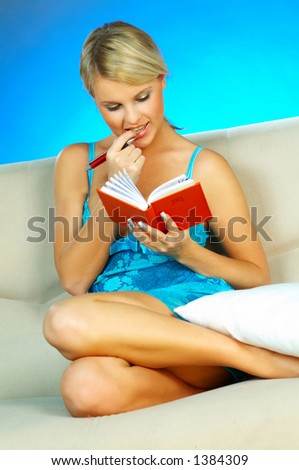 Blond woman with date book