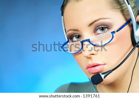 Beautiful young woman working as Call Center operator