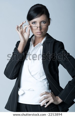 Beautiful brunette business woman with glasses isolated on clear background