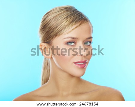 Portrait of beautiful young blond woman, isolated
