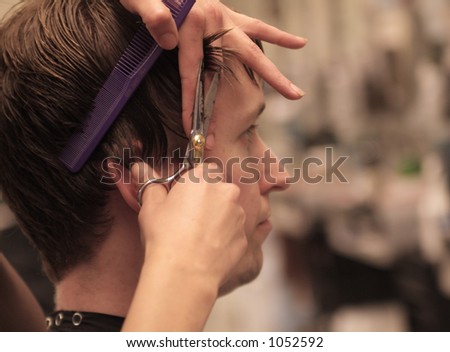 Man getting his hair cut.