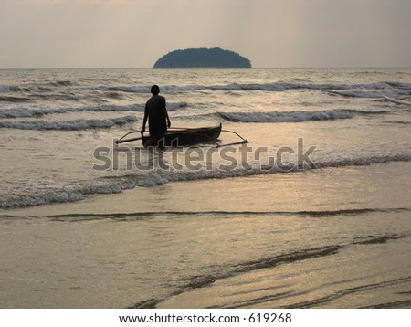 A man going out to sea with his boat