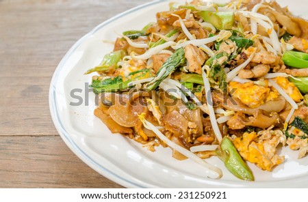 Fried noodles with pork and kale thai style