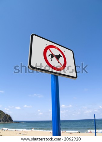 Sign for no dogs beyond this mark.