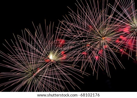Colorful Fireworks display with copyspace left or right.