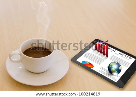 Touch screen device and cup of coffee (Elements of this image furnished by NASA)