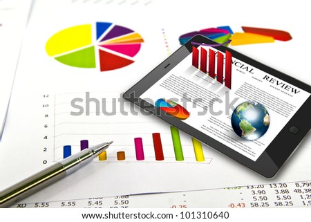 Touch pad and financial Graphs  (Elements of this image furnished by NASA)
