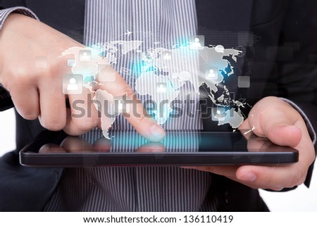 Business man using a touch screen device with social network
