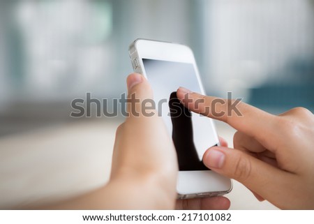 Hand touch the Screen on the Smart Phone