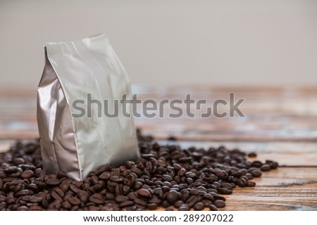 New coffee foil bag on wood table