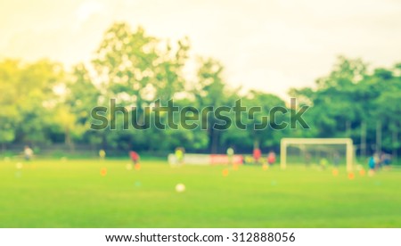 Abstract blur Soccer game ( Filtered image processed vintage effect. )