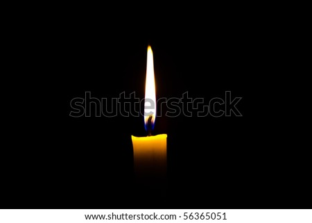 candle isolated on black background