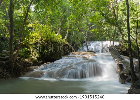 Similar – Image, Stock Photo Waterfall in green forested mountains