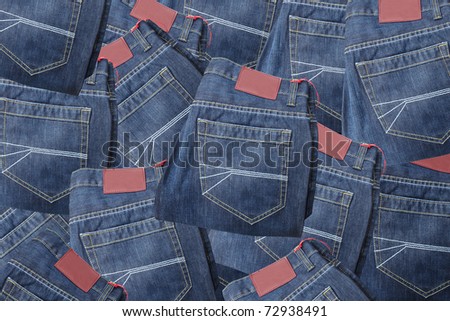 Blue jeans back pocket. Striped textured used blue jeans.