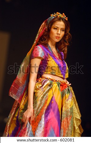 Fashion show by Tuty Cholid inspired by Bohemian and Indian culture custom. collections consists of mix and match, scent panthalon, shirt, blazer, blouse, long dress and stole using Indonesian silk