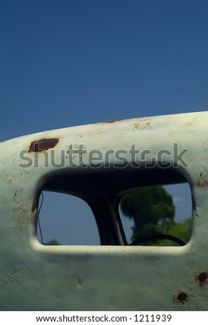 Driver's cabin of old, rusty truck