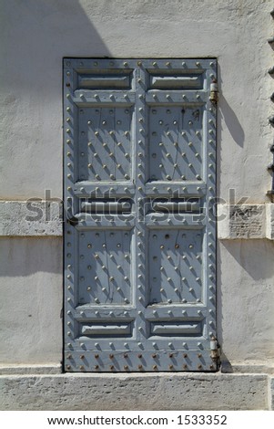 Strong, reinforced wooden door at Villa Borghese, Rome, Italy