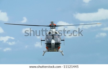 Front view of Eurocopter EC 135 under a flight demonstration at the Singapore Airshow 2008.