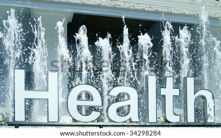 The word Health written in white in a water fountain