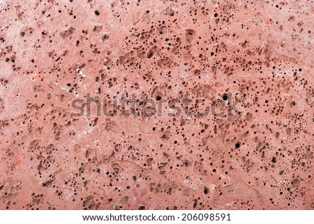 Background of red concrete with bubbles