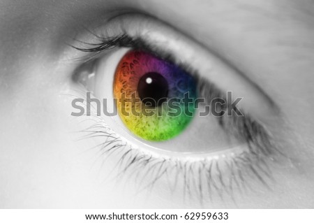 Macro of childs eye with rainbow colors
