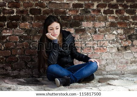 Sad Teenage Girl, Leaning On An Old Brick Wall. Stock Photo 115817500 ...