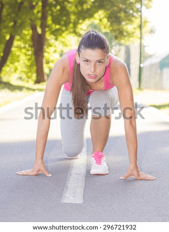 Sporty Fitness Healthy Young Woman ready for running , outdoor activity Healthy Lifestyle.
