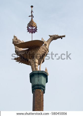 Swan statue on top of pillar in Nang Sao Temple, Samut Sakhon, Thailand