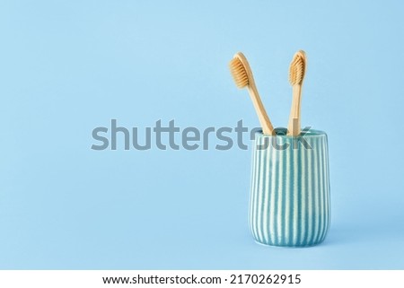 Similar – Image, Stock Photo two bamboo toothbrushes in a jar with space for your text