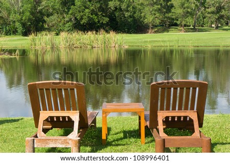 Wood chair on the lake side
