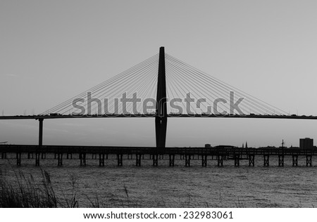 View of a long bridge in black and white, Charleston Arthur Ravenel Jr. Bridge