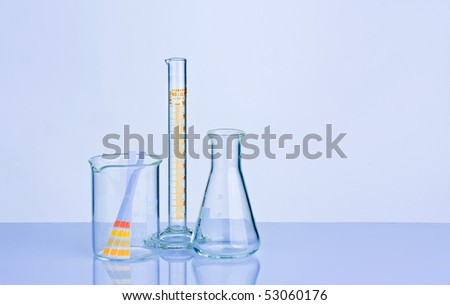 Blue tone chemistry lab containers and PH indicator